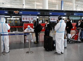 Image: Beijing easing travel rules for US business execs - China's envoy to US