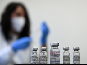 Image: Officials offer vaccine reassurance; WHO advises against travel bans