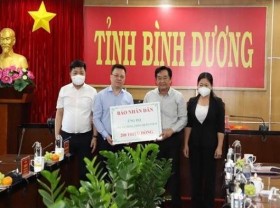 Image: Nhan Dan Newspaper supports Binh Duong in COVID-19 prevention and control