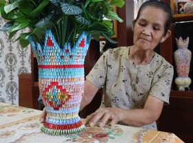 Image: Lottery tickets turned into colourful 3D origami models