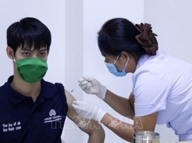 Image: Laos urges more people to get vaccinated against COVID-19