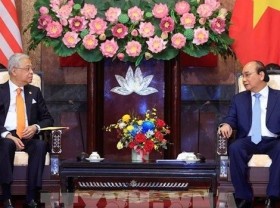 Image: President suggests Vietnam, Malaysia take advantage of FTAs