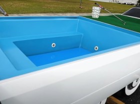 Image: Shut-up of the world’s longest automobile, geared up with a swimming pool and helipad