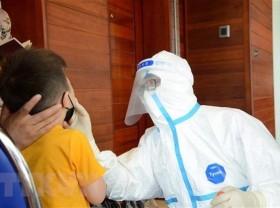 Image: Laos enhances preparation to deal with spread of variant Omicron