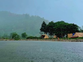 Image: Camping in the rain on holiday