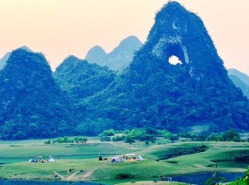 Image: Nui Thung: the angel eye of the mountain in Cao Bang Province
