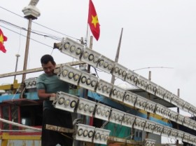 Image: Fishing ships sailing out to the sea for billions in profit