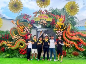 Image: In southern Vietnam, couples favor massive wedding gates made from veggies