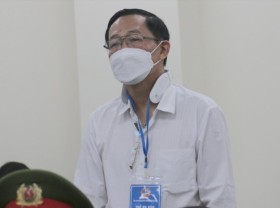 Image: Former deputy health minister stands trial
