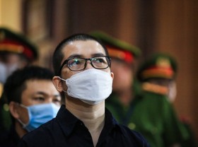 Image: Vietnamese realty firm chairman receives life sentence for fraud
