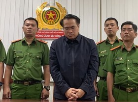 Image: Vietnam Register chief detained on bribe-taking allegations
