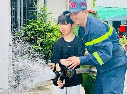 Image: Over 100 Children Experience a Day as Firefighters