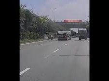 Image: Passenger Van Overturns After Collision with Truck