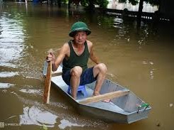 Image: Severe Flooding in Hanoi: Residents Use Boats to Navigate Streets