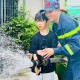 Image: Over 100 Children Experience a Day as Firefighters