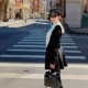 Image: Quyen Linh's Wife Showcases Luxury Fashion in the US
