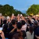 Image: Crowds Gather Outside Huan Hoa Hong's Home Amid Controversy