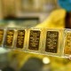 Image: Global Gold Prices Drop Below $4,400/ounce Amid Domestic Surge