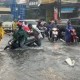 Image: National Route 1 Flooded, Motorcycles Toppling in Water