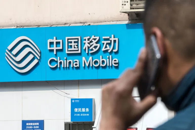 New York Stock Exchange delisting 3 Chinese firms under Trump order