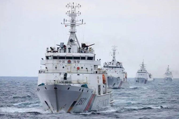 Philippines responds to China s new bill to allow Coast Guard to open fire