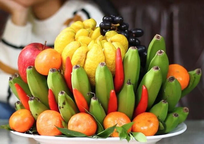 Vietnam Tet s regional five fruit tray in differences