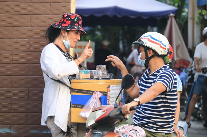 The Belarusian who sells cakes on Saigon sidewalk I haven ...