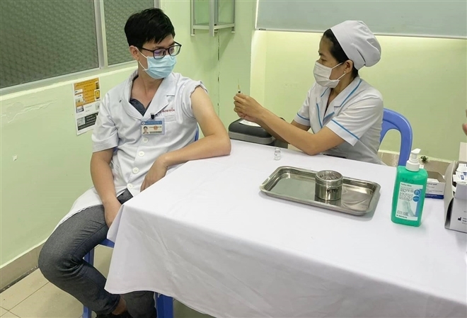 Vietnam hastens Covid 19 vaccination campaign out of expiration concerns