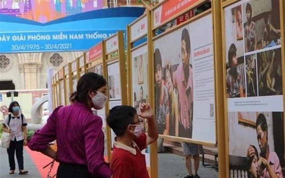 Exhibition on AO/dioxin pain, lawsuit underway in HCM City