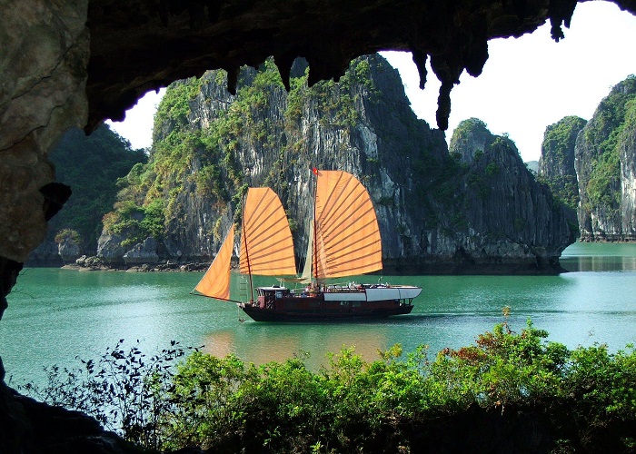 Travel to Ha Long Bright and Dark Cave to admire the beautiful scenery and enjoy the experience