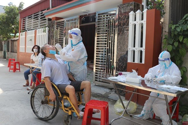 Vietnam witnesses triple-digit Covid-19 spike