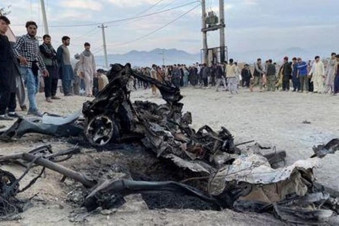 Afghan school blast toll rises to 58, families bury victims