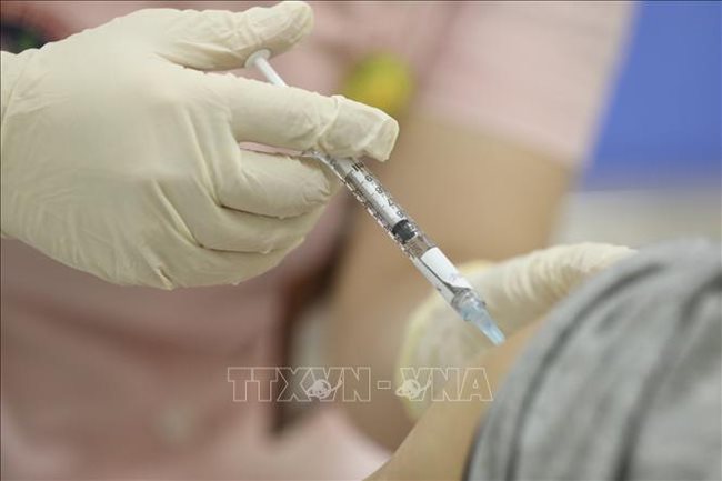 HCMC to establish team to buy Covid-19 vaccines