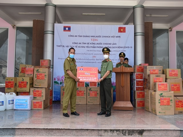 China Laos present medical supplies to assist Vietnam s Covid 19 fight