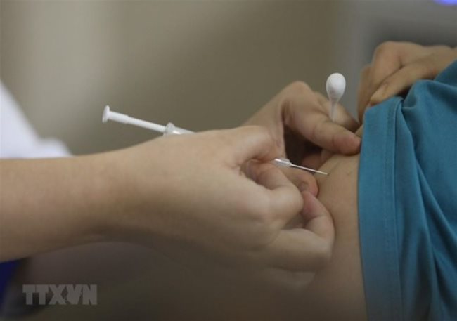 Vietnam reports highest-ever 24-hour surge in Covid-19 cases