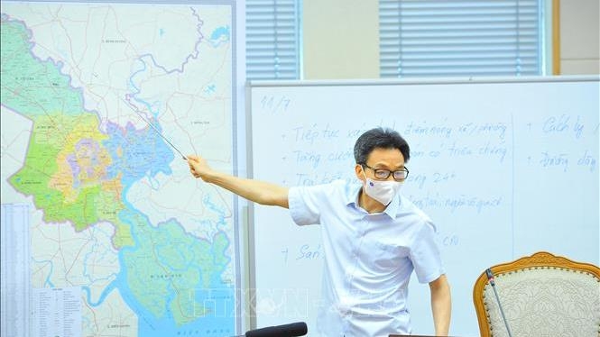Ho Chi Minh City on right track in COVID-19 fight: official