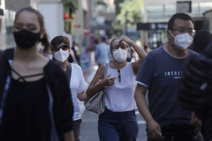 Brazil reports 1,556 more COVID-19 deaths