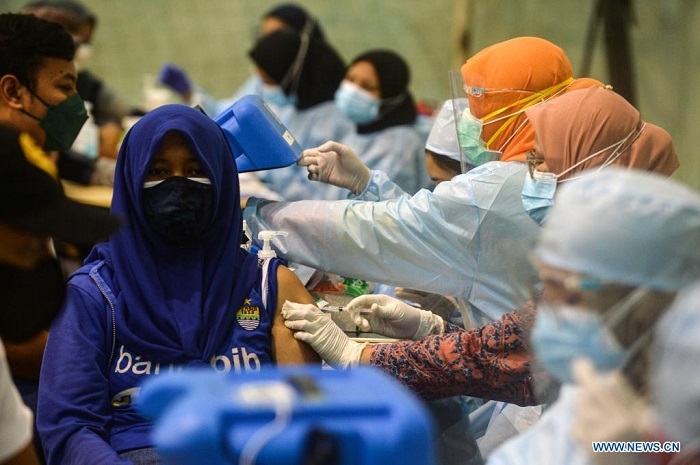 Indonesia reports 51,952 newly-confirmed COVID-19 cases, 1,092 new deaths