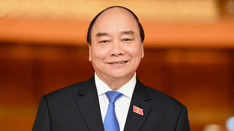 President Nguyen Xuan Phuc pays official friendly visit to Laos