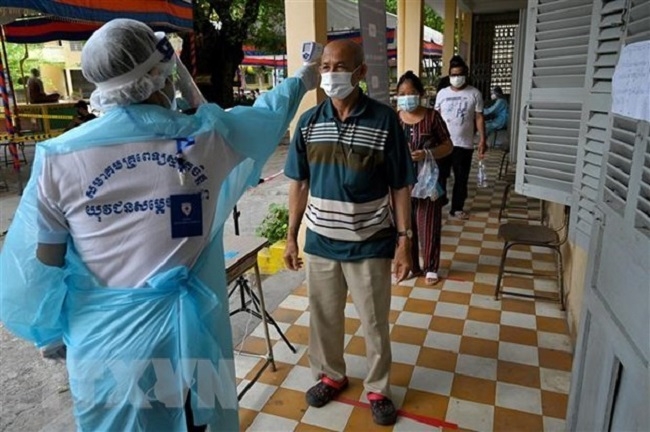 Laos extends lockdown to contain spread of COVID-19