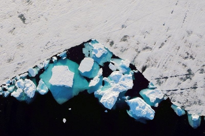 Rain falls at Greenland ice summit for first time on record
