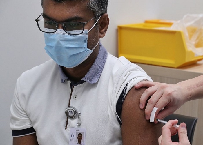 Singapore fully vaccinates 80% of population against COVID-19
