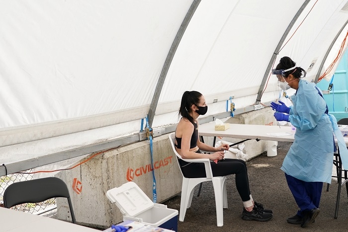 Australian doctors warn health system may 'capsize' when COVID-19 curbs ease