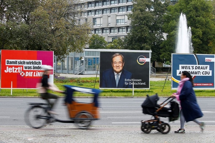 Germans vote in close election to decide Merkel successor