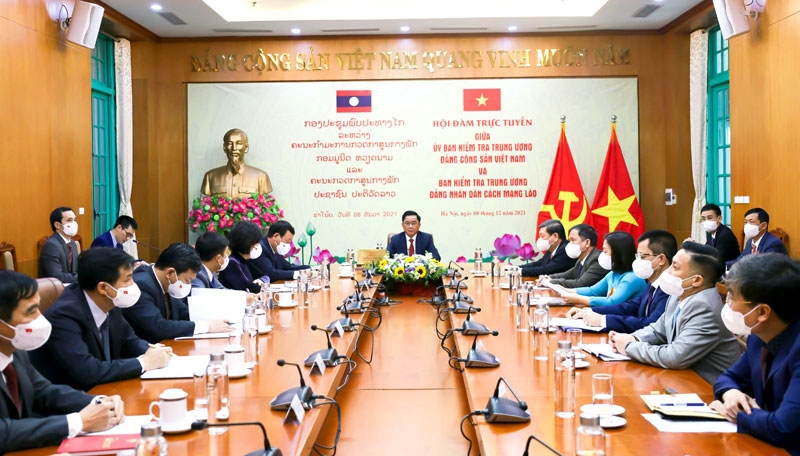 Party inspection commissions of Vietnam, Laos strengthen ties