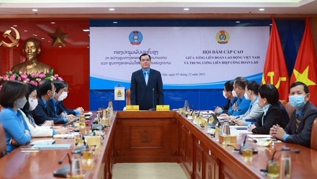 Vietnam, Laos forge trade union cooperation