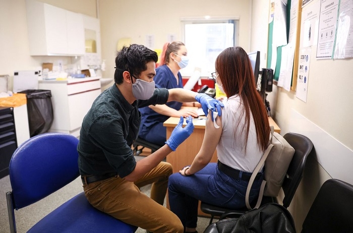 England opens COVID booster jab programme to 16- and 17-year olds