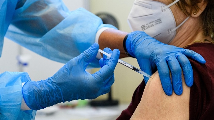 Australians told to get COVID boosters to be considered fully vaccinated
