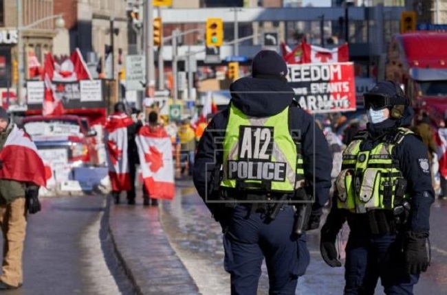 Canada's Trudeau invokes emergency powers in bid to end protests