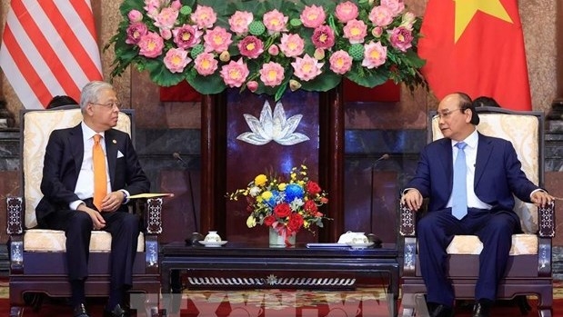 President suggests Vietnam, Malaysia take advantage of FTAs